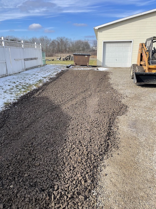 Example of preparaing land for driveway work
